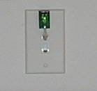 Monitoring room temperature via a wallplate 